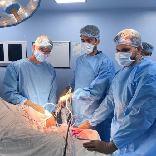 Dr. Dipen Ariwala and Orthopedic surgeons performing live surgery in operating room